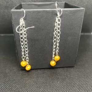 Plain Gold pearls earrings.
